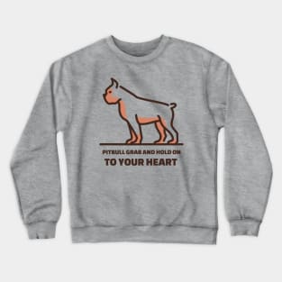 Pit Bulls grab and hold on, but they grab and hold on to your heart. Crewneck Sweatshirt